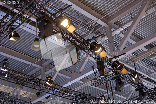 Image of Lighting on farms over the stage in the theater.