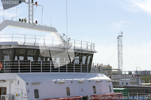 Image of Wheelhouse of the ship with antennas on the mast