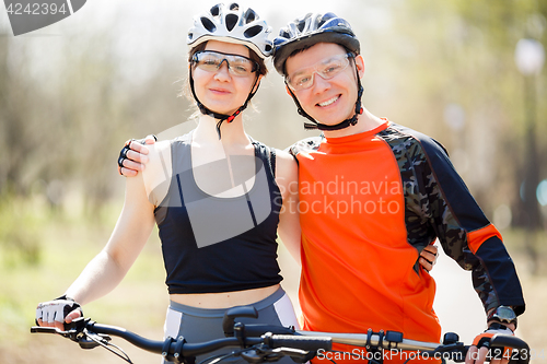 Image of Portrait of athletes with bicycles