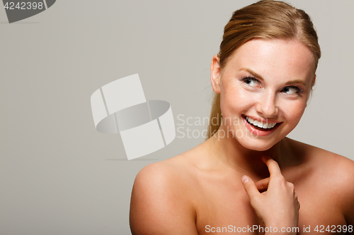 Image of Young girl with bare shoulders