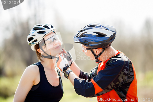 Image of Cyclists in helmets at park