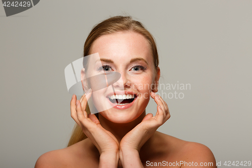 Image of Beautiful woman on gray background