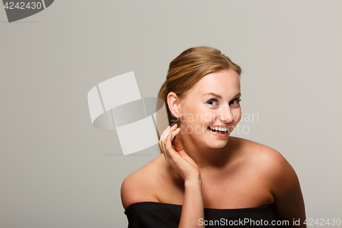 Image of Smiling girl in black dress