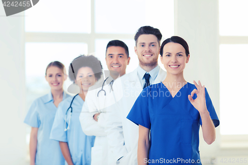 Image of group of happy doctors at hospital