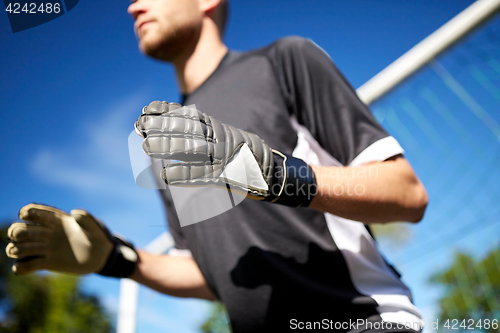 Image of goalkeeper or soccer player at football goal