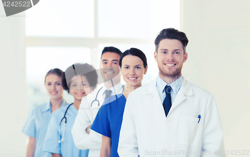 Image of group of happy doctors at hospital