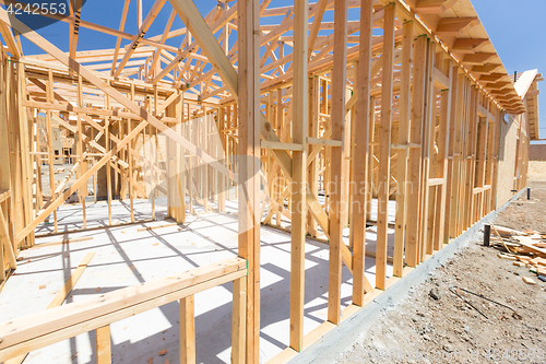 Image of Wood Home Framing Abstract At Construction Site.