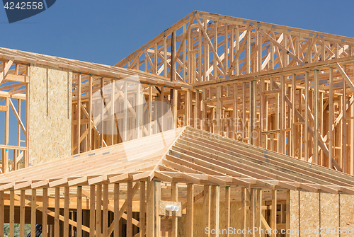 Image of Wood Home Framing Abstract At Construction Site.