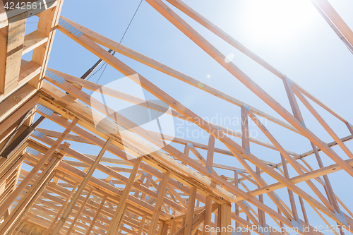 Image of Wood Home Framing Abstract At Construction Site.
