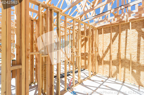 Image of Wood Home Framing Abstract At Construction Site.