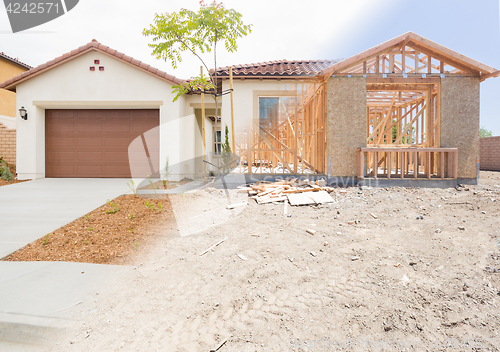 Image of Transition of New Home From Framing To Completion