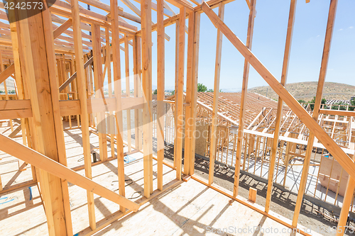 Image of Wood Home Framing Abstract At Construction Site.