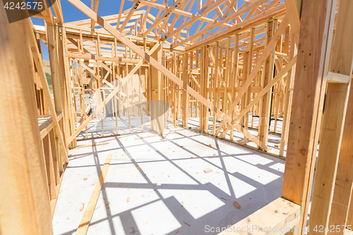 Image of Wood Home Framing Abstract At Construction Site.