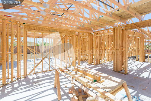 Image of Wood Home Framing Abstract At Construction Site.