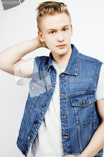 Image of young handsome teenage hipster guy posing emotional, happy smiling against white background isolated, lifestyle people concept closeup