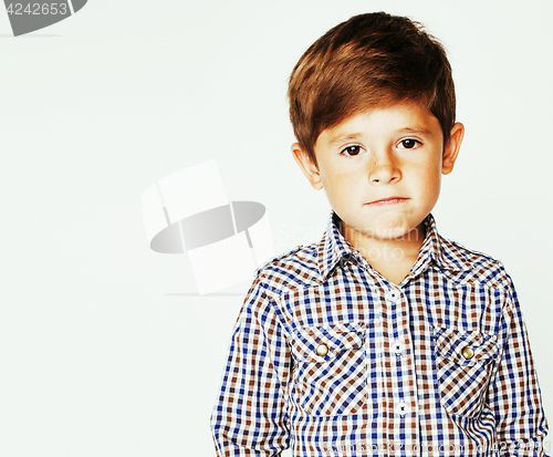 Image of young pretty little cute boy kid wondering, posing emotional fac