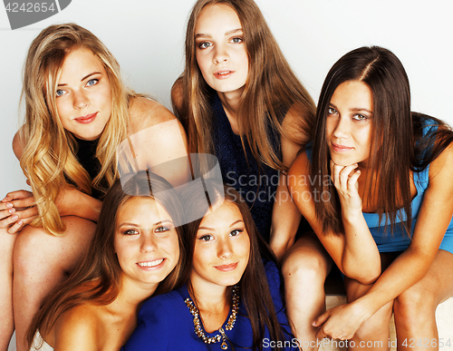 Image of many girlfriends hugging celebration on white background, smilin