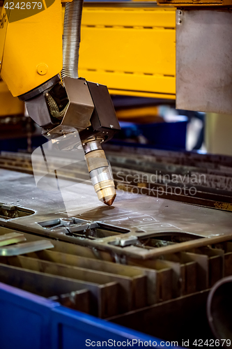 Image of CNC Laser plasma cutting of metal, modern industrial technology.