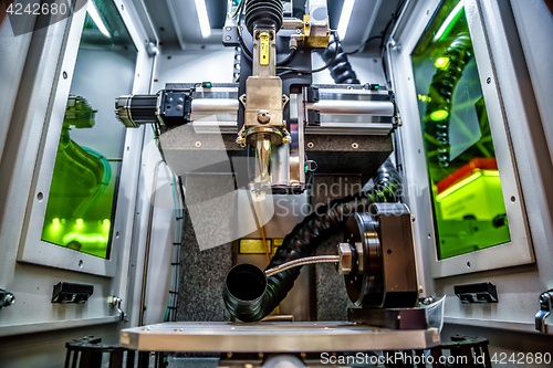 Image of CNC Laser cutting of metal, modern industrial technology.