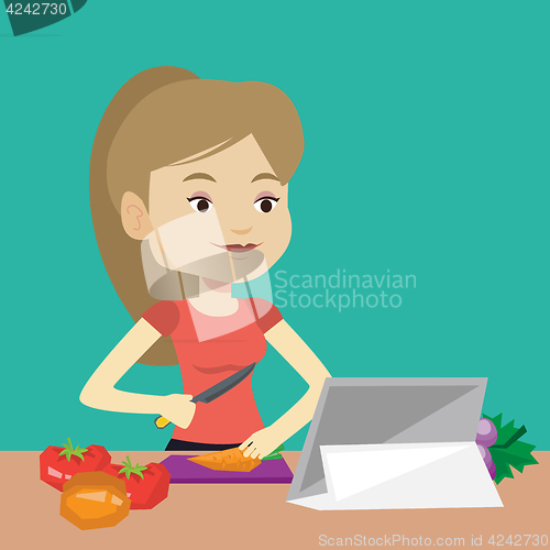 Image of Woman cooking healthy vegetable salad.