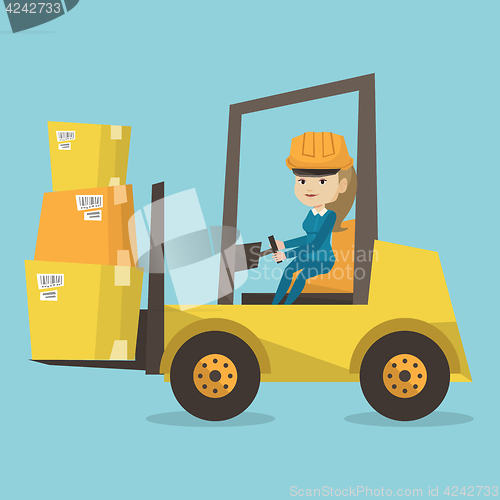 Image of Warehouse worker moving load by forklift truck.