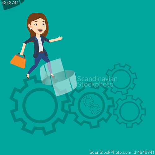 Image of Business woman running on cogwheels.