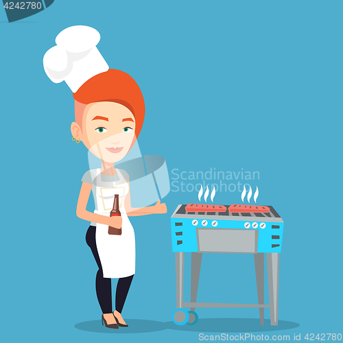 Image of Woman cooking steak on barbecue grill.