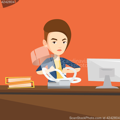 Image of Angry business woman tearing bills or invoices.