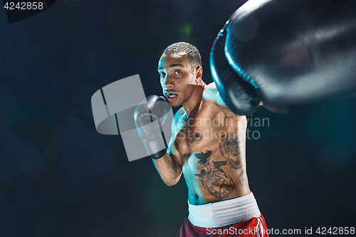 Image of Afro american male boxer.