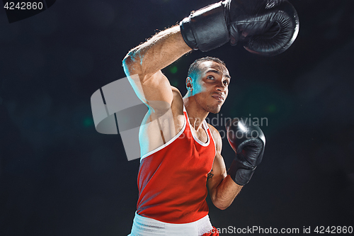 Image of Afro american male boxer.