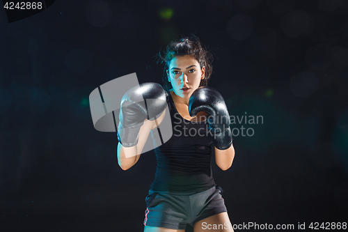 Image of The female boxer training at sport club