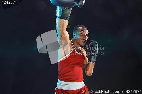 Image of Afro american male boxer.