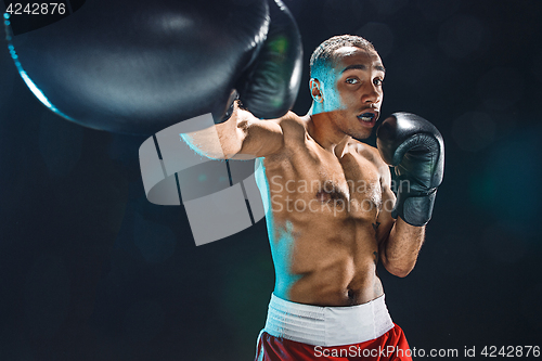 Image of Afro american male boxer.