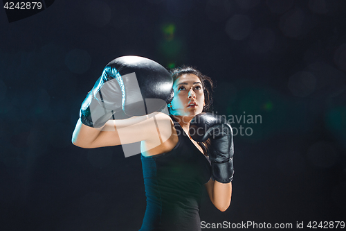 Image of The female boxer training at sport club