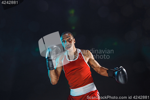 Image of Afro american male boxer.