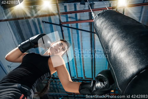 Image of The female boxer training at gym