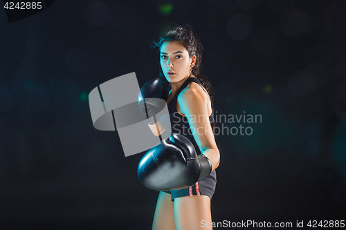 Image of The female boxer training at sport club