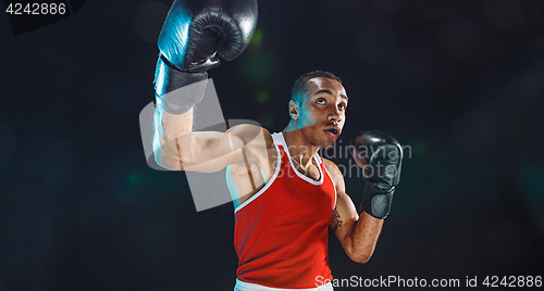 Image of Afro american male boxer.