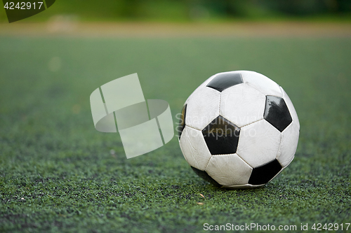 Image of soccer ball on football field
