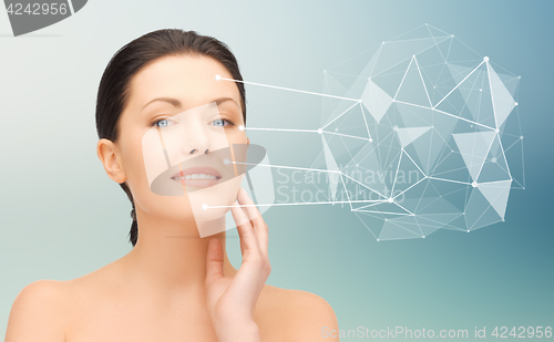 Image of woman face with low poly projection and pointers