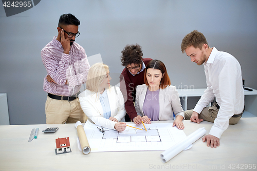 Image of business team discussing house project at office