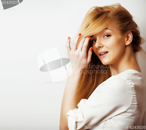 Image of young blond woman on white backgroung gesture thumbs up, isolate