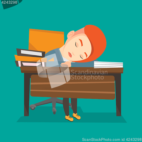 Image of Female student sleeping at the desk with book.