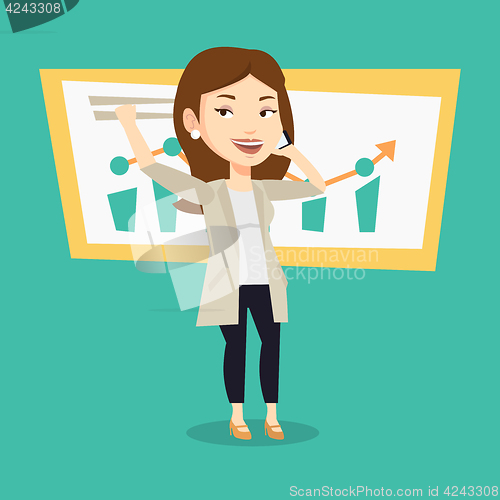 Image of Woman celebrating business success.