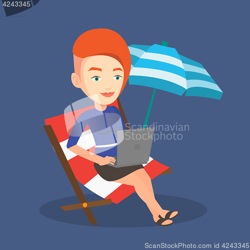 Image of Businesswoman working on laptop at the beach.