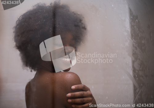 Image of African American woman in the shower