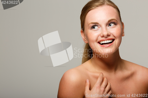 Image of Beautiful woman on gray background