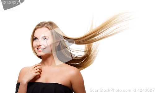 Image of Beautiful girl with flying hair