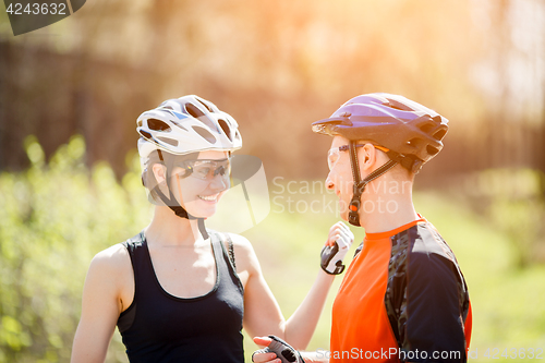 Image of Athletes in helmets at park