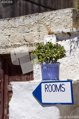 Image of greek island street scene rooms for rent